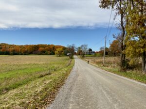 A farmhouse on a dirt road in Vermont